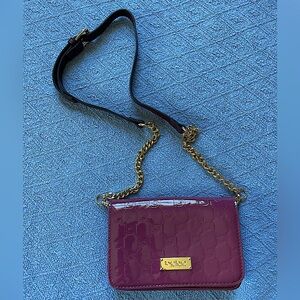 Bebe convertible clutch/shoulder bag/crossbody in mauve/berry/wine